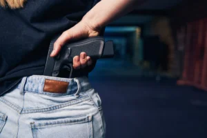 Can I bring a concealed firearm to another person’s house?