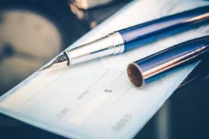 What is check kiting, and why is it considered bank fraud?